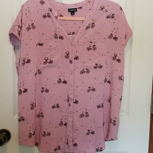 Adorable shirtsleeve button-up bicycle top.